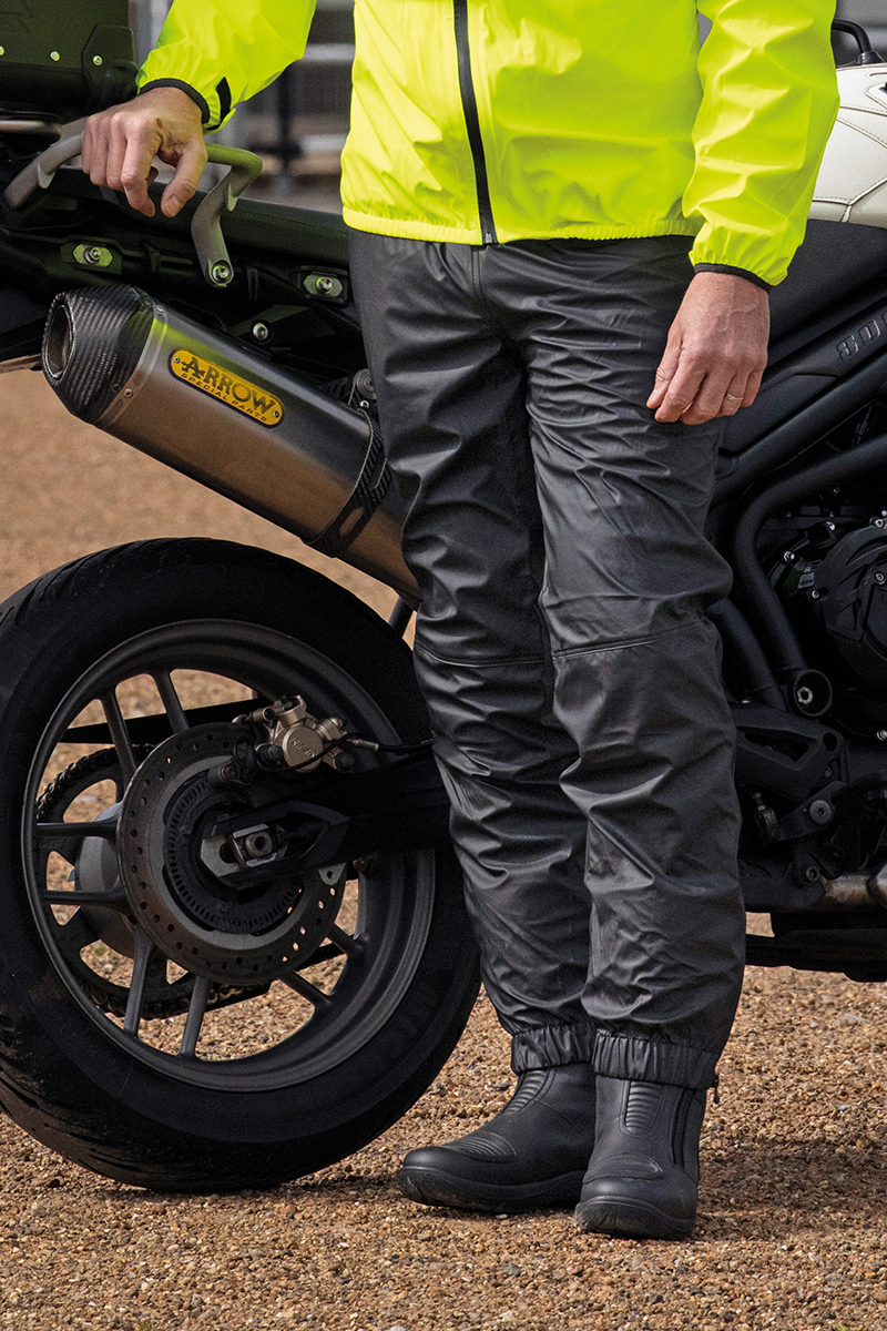 Guy wearing Scott motorcycle waterproof trousers
